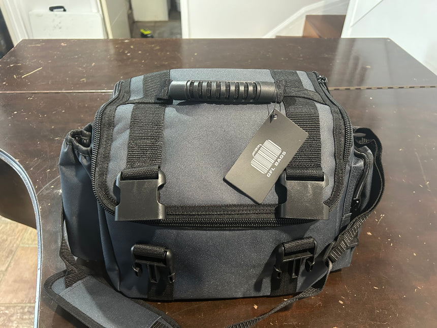 SHNC branded cooler bag with zip closure and handles