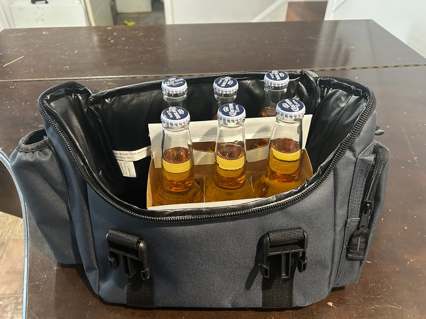 SHNC branded cooler bag with zip closure and handles